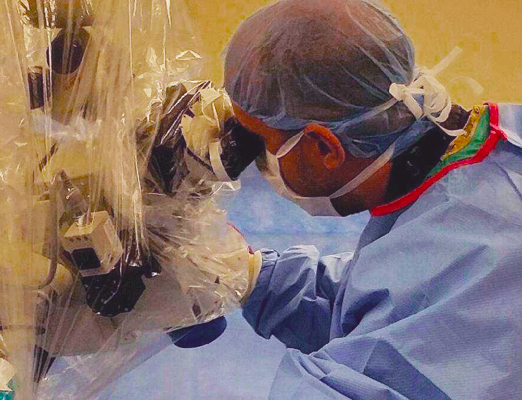 dr. william wirchansky placing a shunt into the brain of a hydrocephalus patient